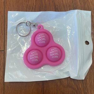 Anti Social Social Club Still Stressed Again Pink Pop Socket Keychain